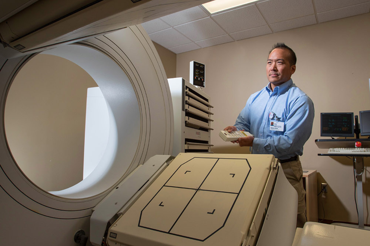 Man at MRI machine