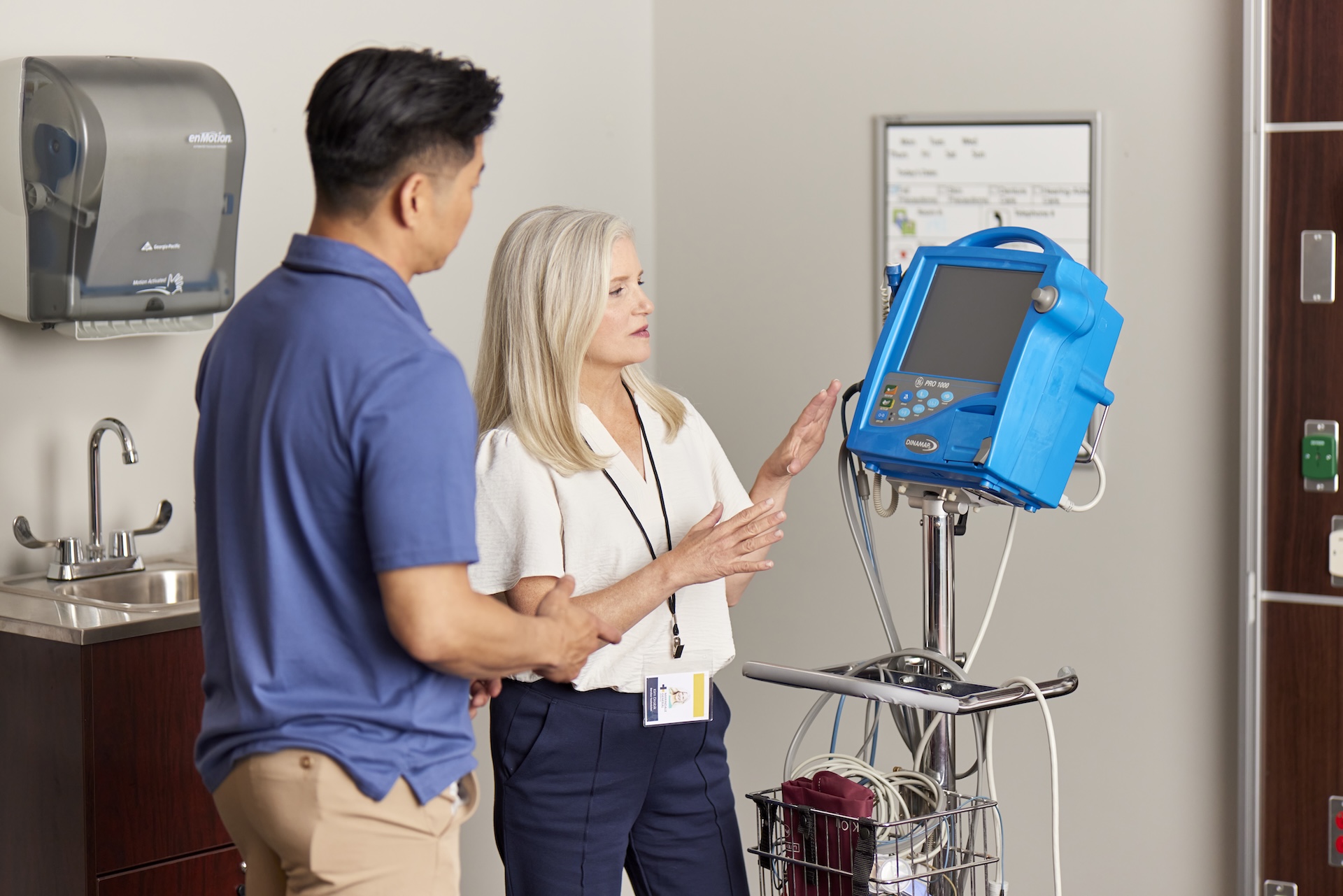 Intelas physician provider reviewing equipment
